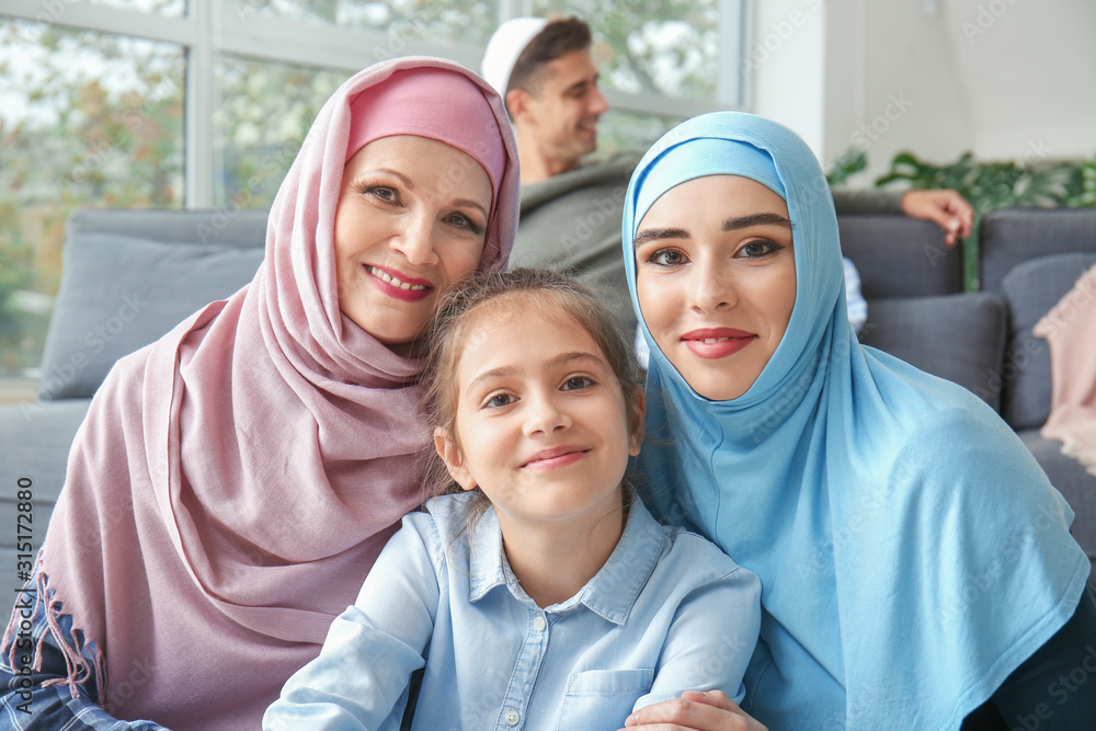 Portrait of happy Muslim family at home Portrait of happy Muslim family at home