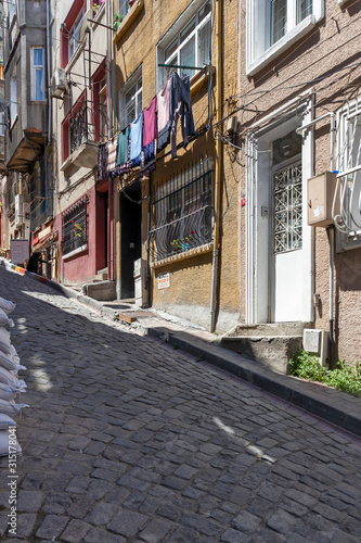 Fototapeta Naklejka Na Ścianę i Meble -  Street and building in Balat district in city of Istanbul, Turkey