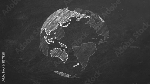 Rotating globe hand drawn with chalk on a school blackboard