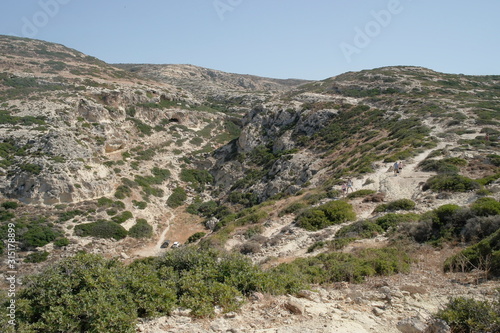 the road to Red beach through the mountains. The resort of Matala, Crete, Greece