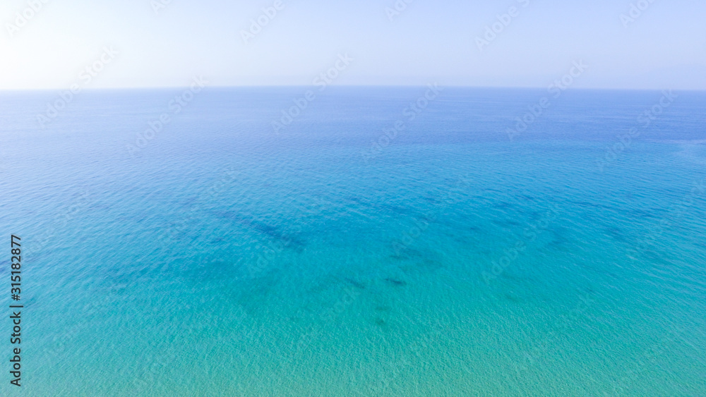 Aerial view of open turquoise crystal clear sea 