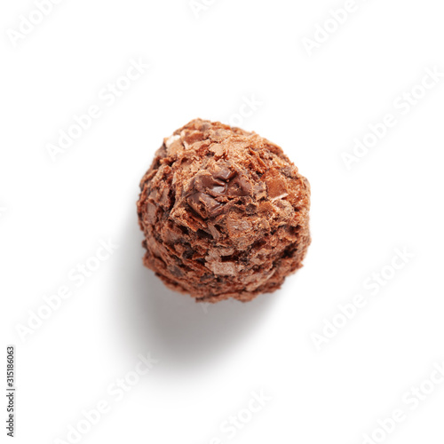 Chocolate candy with wafer crumbs on white, isolated