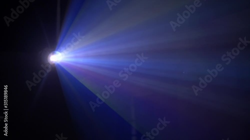 4K Shot Of Beautiful Big Rays Of Colours Shining Out Of Projector Surrounded By Smoke. Bright Light Shining In Different Direction. Blue And Pink Light Spinning Around Smoke Hitting It. Glare