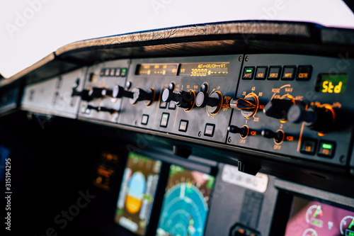 Cockpit of an Airbus A320 in cruise from the first officer seat