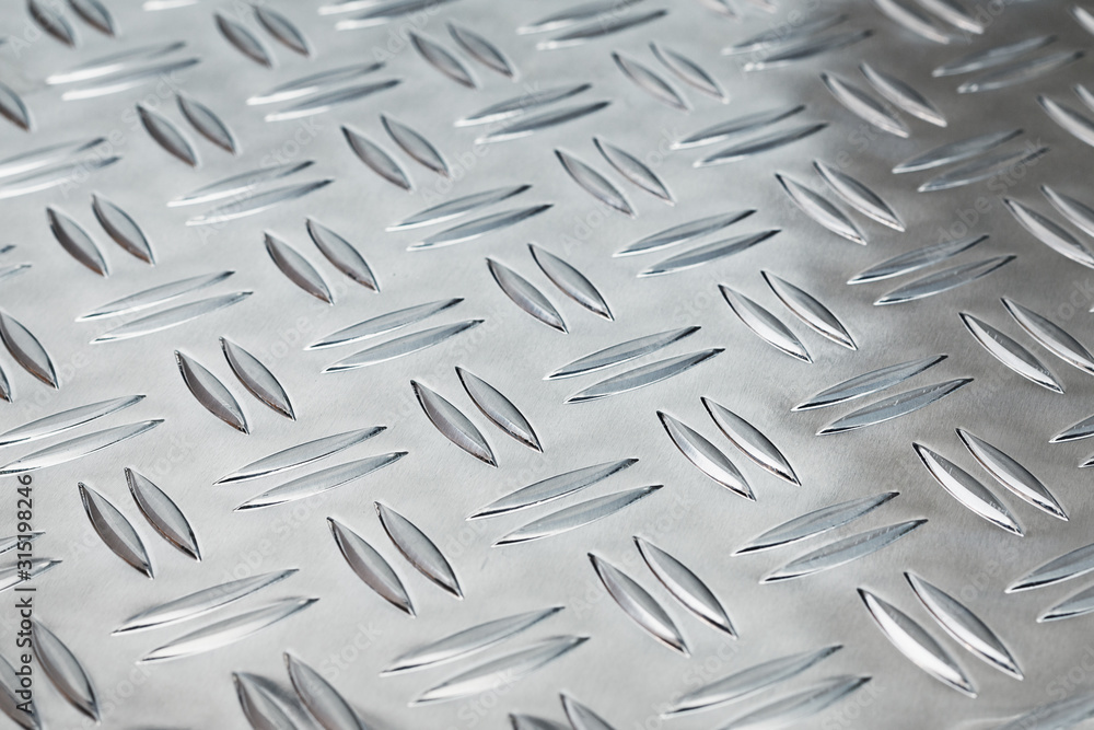 Fototapeta premium Embossed aluminium plate with diamond pattern