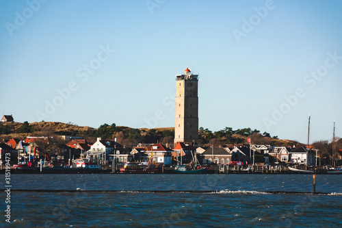 Skyline of Terschelling with lighthouse photo