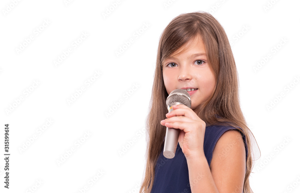 Little girl posing with a microphone for singing on a white background. Little girl posing with a microphone for singing on a white background.