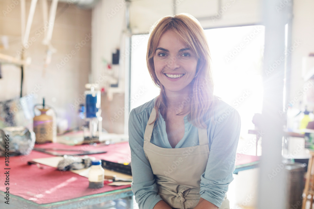 Portrait smiling artist in studio Portrait smiling artist in studio