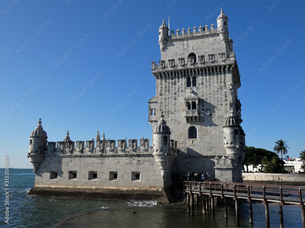 Fortress tower in Lisbon under a blue sky