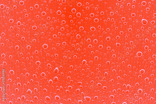 Orange lush lava color abstract background with water drop pattern