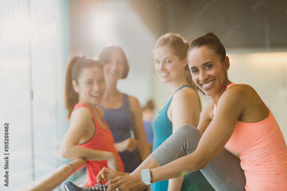 Portrait smiling women in gym studio Portrait smiling women in gym studio