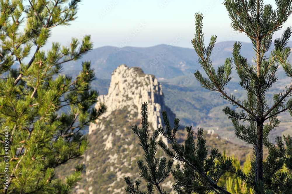 General view of Via Ferrata Rocher du Saint-Julien surrounded by mountains in southeastern France