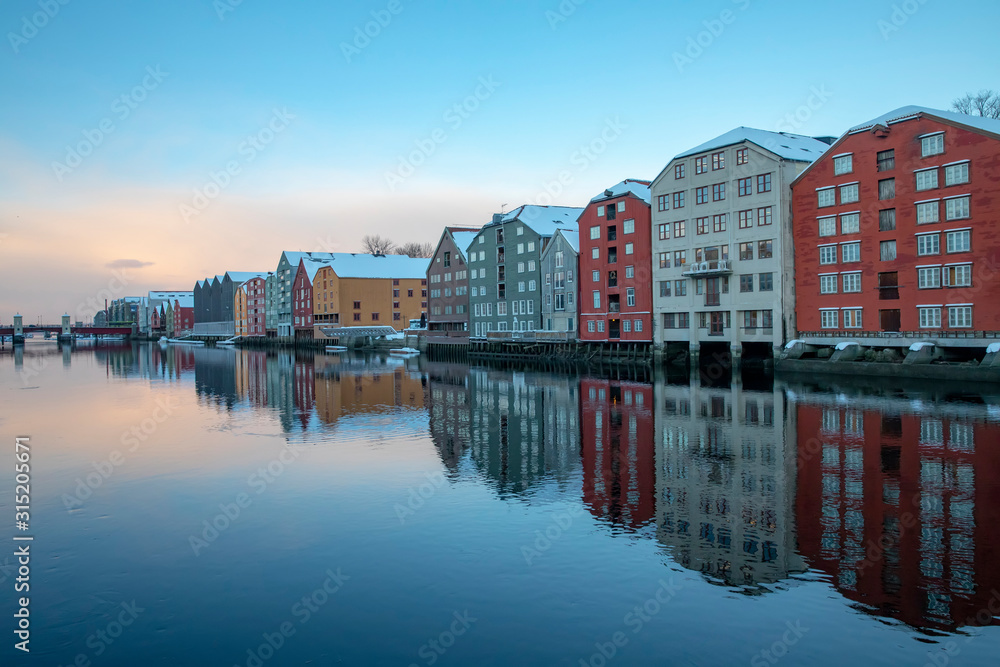 Old warehouse by the Nidelv river in Trondheim Norway	
