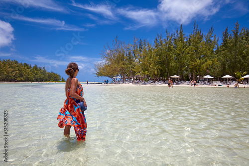 Girl in the white beaches in Ile aux Cerfs, Mauritius © Massimo Pizzotti
