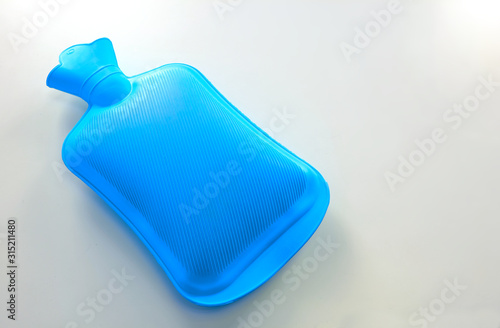 A blue plastic hot water bottle