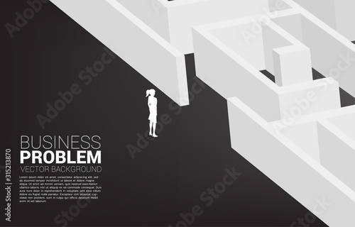 Silhouette of businesswoman ready to enter to maze. Business concept for problem solving and solution strategy