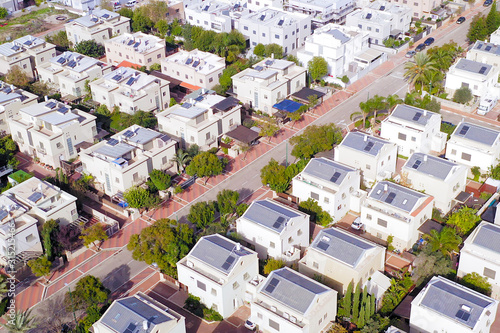 Aerial view of a Middle class Suburban neighbourhood houses. photo