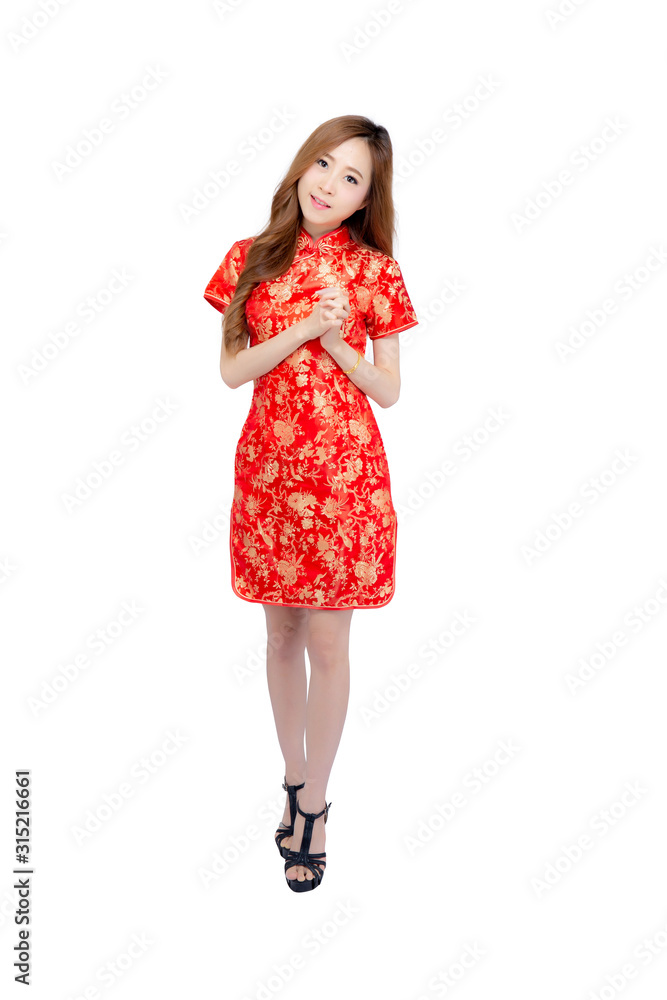 Beautiful portrait happy Chinese New Year young asian woman wear cheongsam fashion smile with gesture congratulation and greeting isolated on white background, festival and celebrate concept. Beautiful portrait happy Chinese New Year young asian woman wear cheongsam fashion smile with gesture congratulation and greeting isolated on white background, festival and celebrate concept.