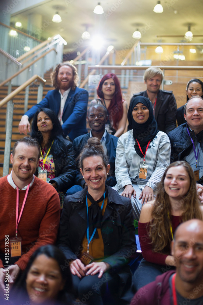 © Martin Barraud/Caia Image - Attentive, smiling conference audience listening © Martin Barraud/Caia Image - Attentive, smiling conference audience listening