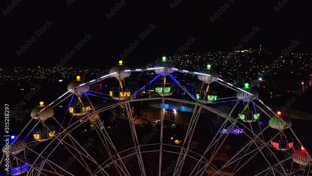 Big ferris wheel and amazing colorful lights Big ferris wheel and amazing colorful lights
