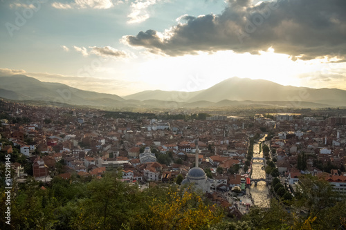 Panorama of the city center of Prizren, Kosovo, with minarets of Mosques and the Bistrica River. Prizren is the second biggest city of Kosovo and a major ottoman architecture and cultural landmark photo