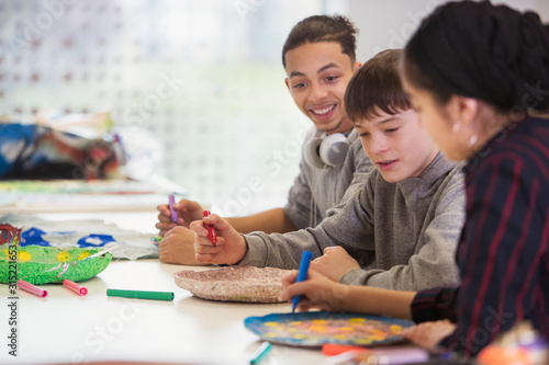 High school students doing arts and crafts