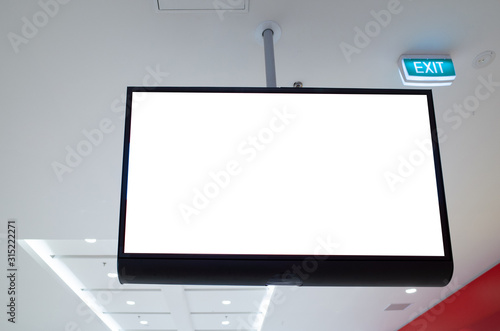 Mock up template of blank white digital display screen. Background texture of a ceiling mounted information/advertisement light box.