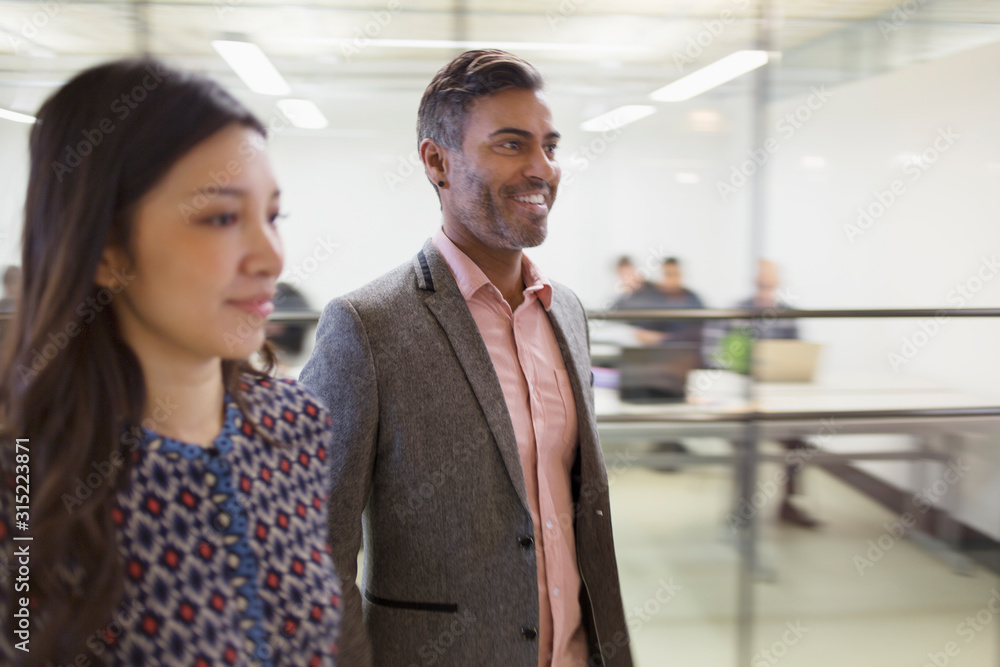Business people walking in office Business people walking in office