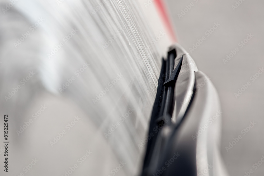 suv back window of a dirty car in a layer of dust, close up of a dirty vehicle with minimum depth of field. suv back window of a dirty car in a layer of dust, close up of a dirty vehicle with minimum depth of field.