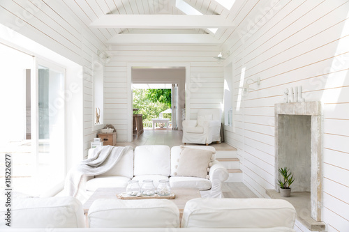 White wood shiplap home showcase beach house living room