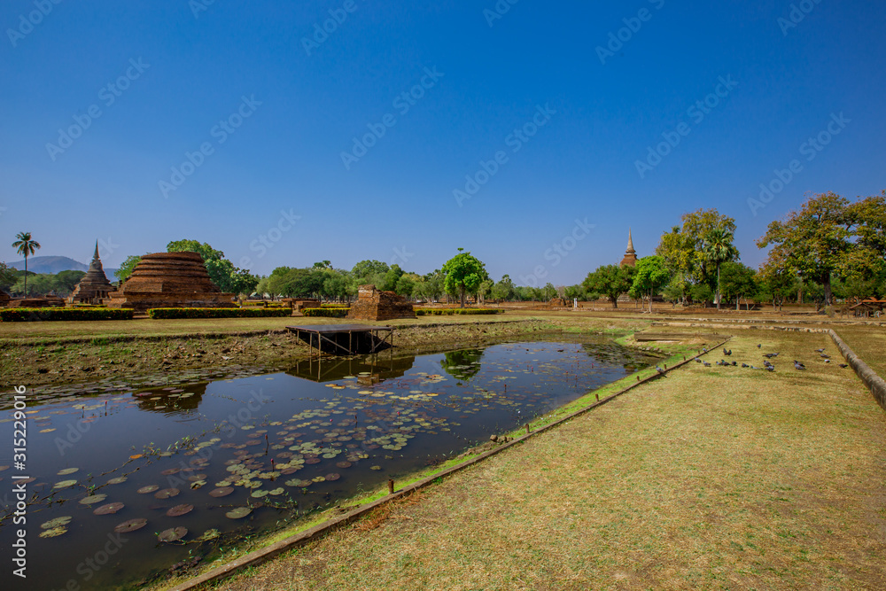 Background, the landmark of the Buddhist tourist attraction in Sukhothai Historical Park, tourists all over the world come to see the beauty always in Thailand. Background, the landmark of the Buddhist tourist attraction in Sukhothai Historical Park, tourists all over the world come to see the beauty always in Thailand.