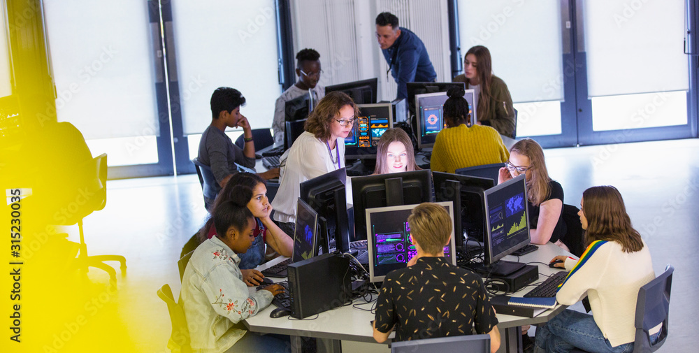© Chris Ryan/Caia Image - Junior high students using computers