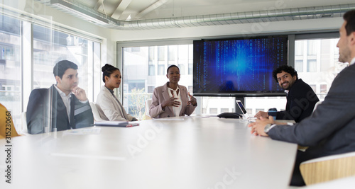 Business people talking in conference room meeting photo