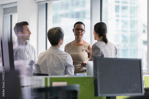 Business people talking, meeting in office photo