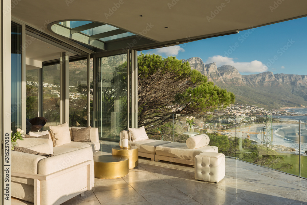 Sunny modern luxury home showcase balcony with mountain view Sunny modern luxury home showcase balcony with mountain view