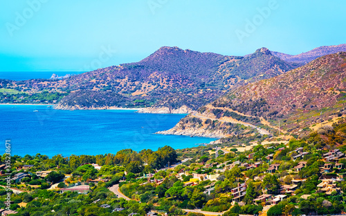 Fototapeta Naklejka Na Ścianę i Meble -  Beautiful nature of Villasimius and with Blue Waters of the Mediterranean Sea on Sardinia Island in Italy in summer. Cagliari province. Landscape and scenery