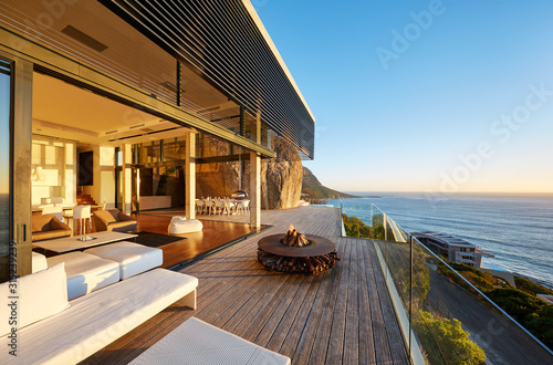 Modern luxury patio with fire pit and ocean view