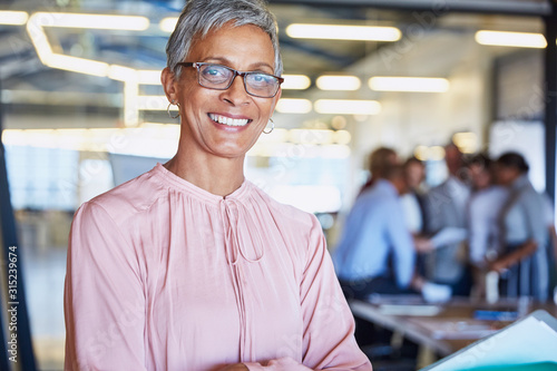 Portrait confident businesswoman photo