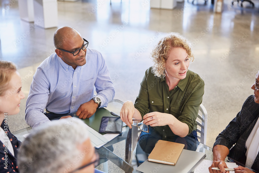 Business people talking in meeting Business people talking in meeting
