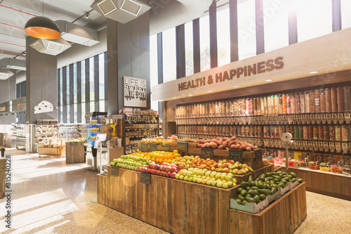 Produce and bulk food on display in health food grocery store market