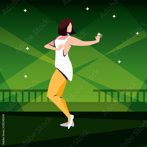 young woman dancing in nightclub