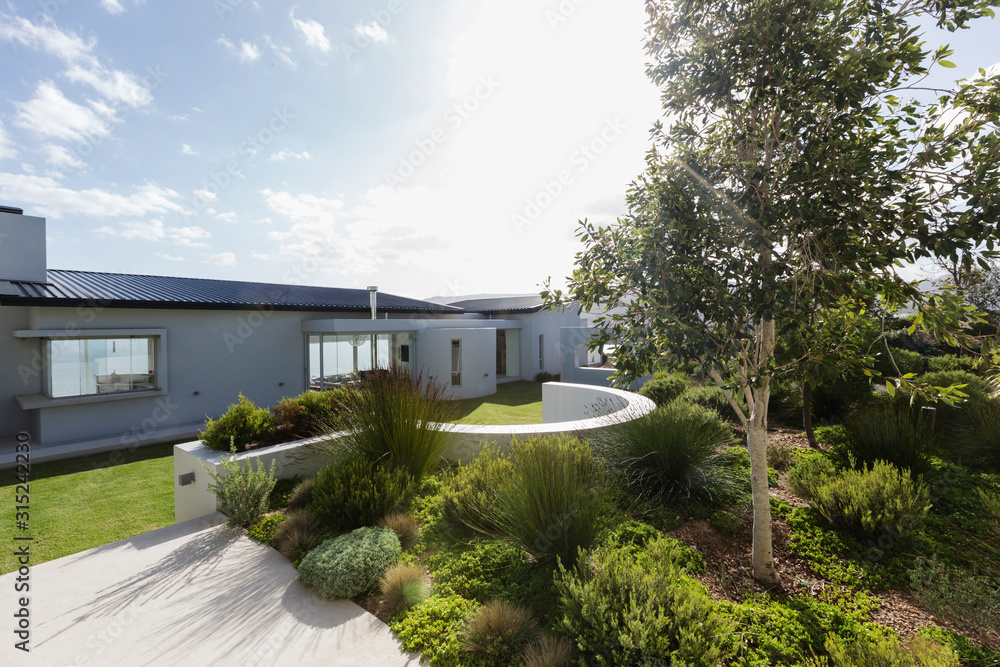 Sunny, tranquil home showcase exterior and landscaping Sunny, tranquil home showcase exterior and landscaping