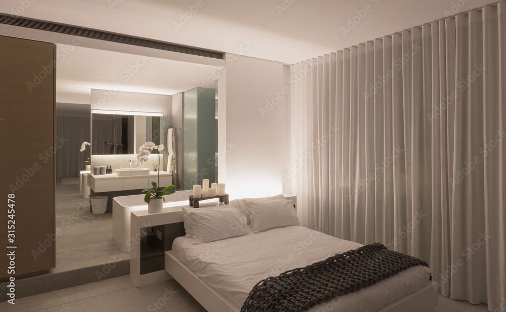 Illuminated modern, luxury home showcase interior bedroom Illuminated modern, luxury home showcase interior bedroom