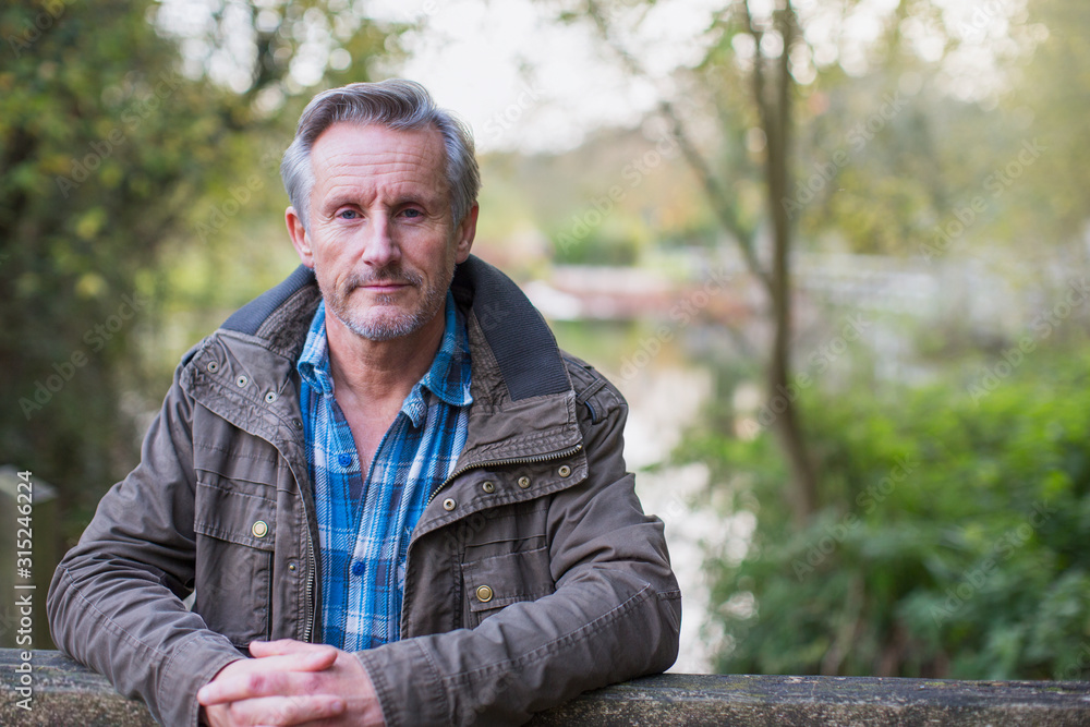 Portrait confident senior man in park Portrait confident senior man in park
