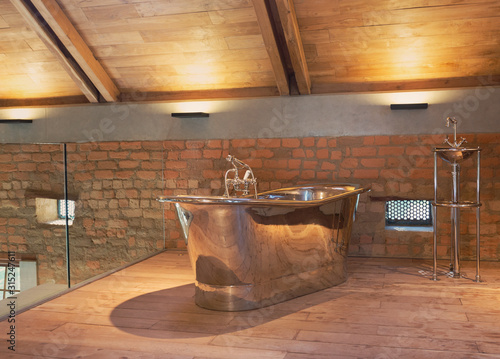 Home showcase interior stainless steel bathtub in loft bathroom photo