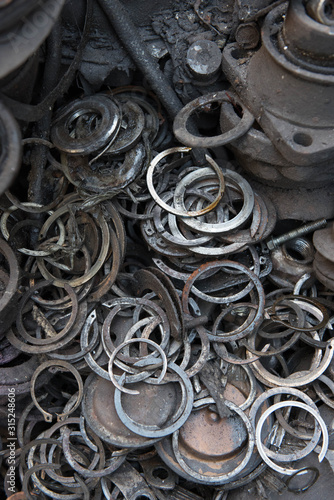 Close-up of old parts, nuts and bolts.