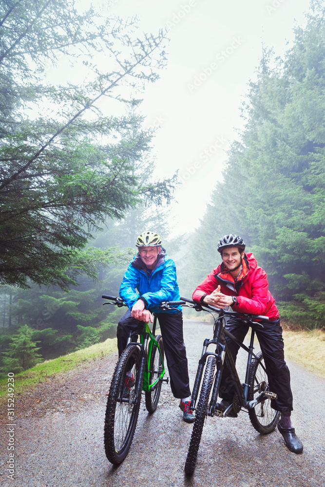 Father and son mountain biking Father and son mountain biking