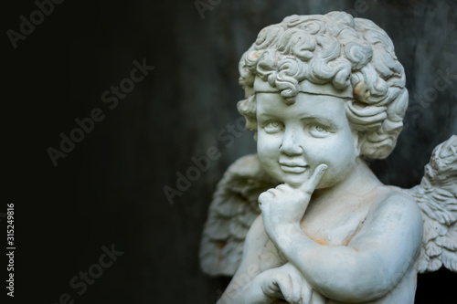Stucco doll, Cupid, the god of conveying love in Western beliefs 