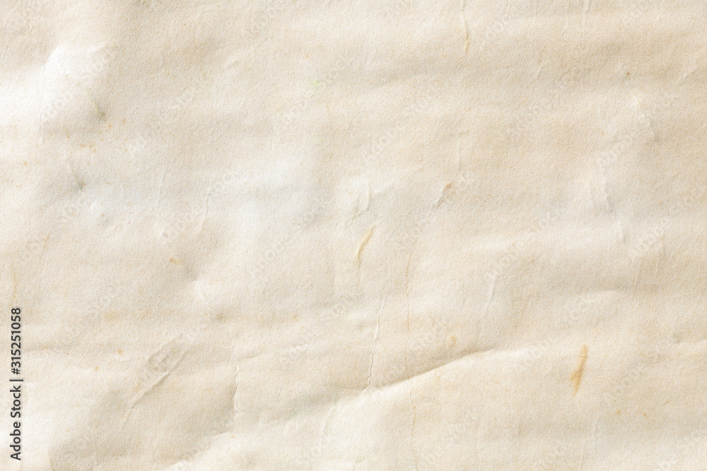 Naklejka premium Brown crumpled background paper texture