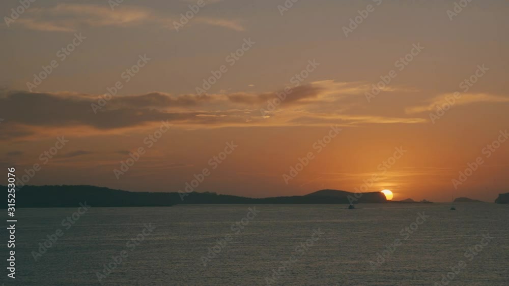 Ibiza sunset behind the mountain islands Ibiza sunset behind the mountain islands